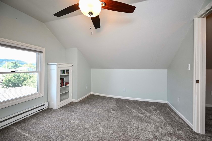 Welcome to this beautifully maintained 2.5-story home in a - photo 28