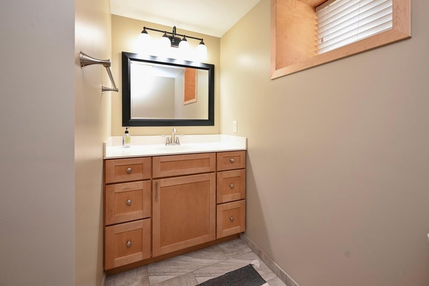 Welcome to this beautifully maintained 2.5-story home in a - photo 32