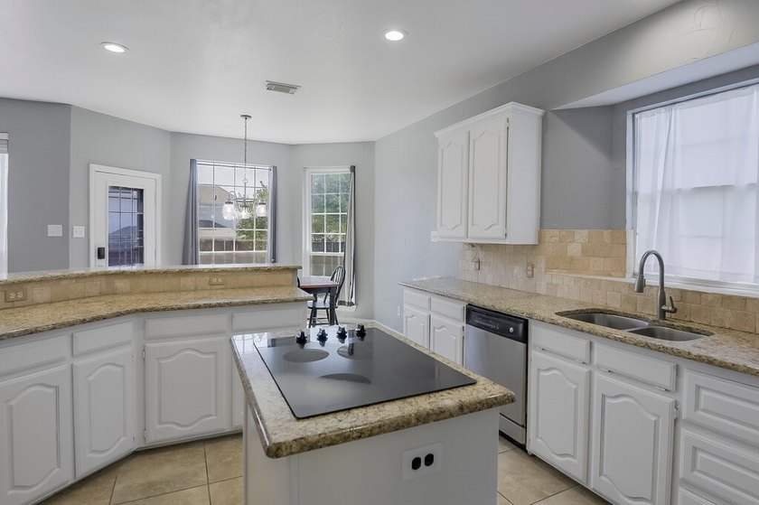Welcome to this thoughtfully designed custom home in highly - photo 12