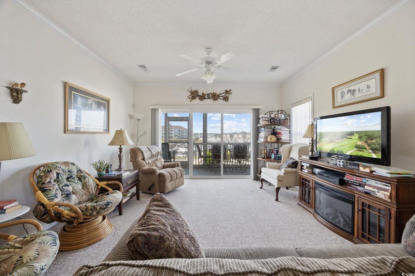 A rare opportunity to own a highly sought-after end unit in the - photo 3