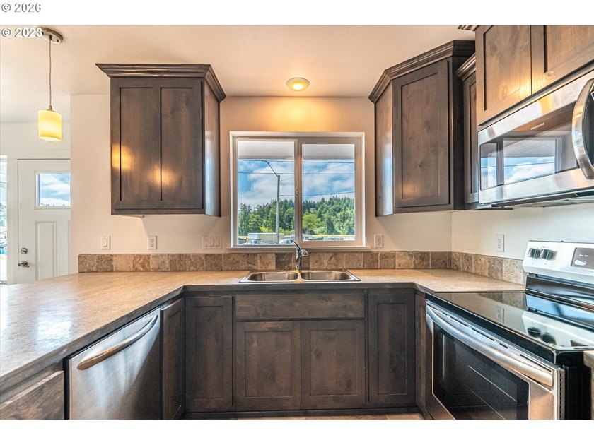Built in 2023, this like-new 2-bedroom, 1-bath home delivers - photo 11
