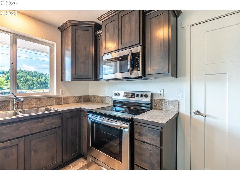 Built in 2023, this like-new 2-bedroom, 1-bath home delivers - photo 13