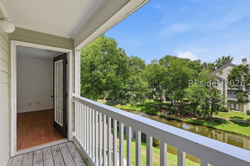 Welcome to this beautifully updated 3-bedroom, 2-bath villa - photo 2