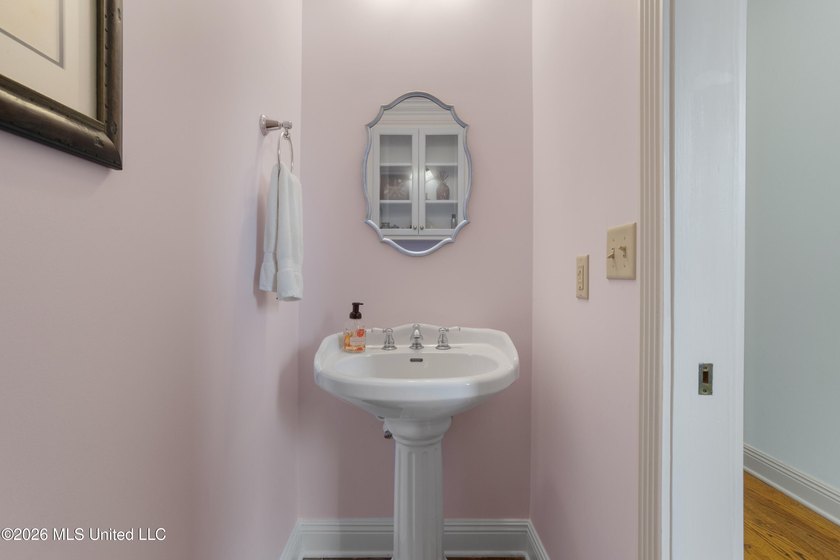 This two-story Coastal Southern Style home is nestled in a - photo 19