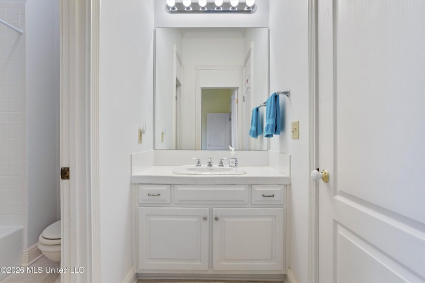 This two-story Coastal Southern Style home is nestled in a - photo 26