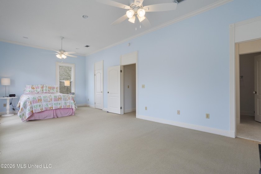 This two-story Coastal Southern Style home is nestled in a - photo 32