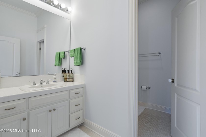 This two-story Coastal Southern Style home is nestled in a - photo 34
