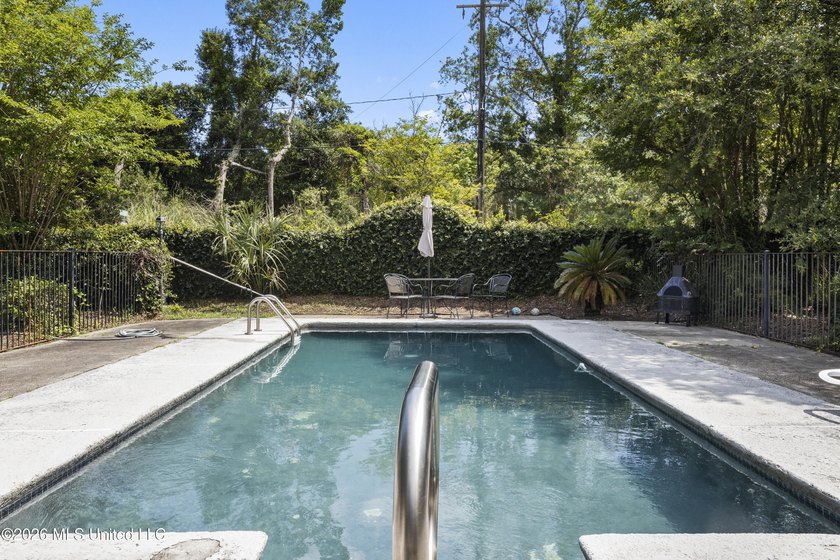 This two-story Coastal Southern Style home is nestled in a - photo 37