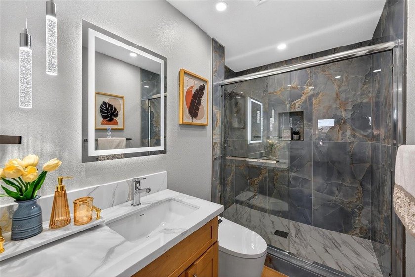 Welcome home to this beautifully remodeled 4BD/2BA residence - photo 37