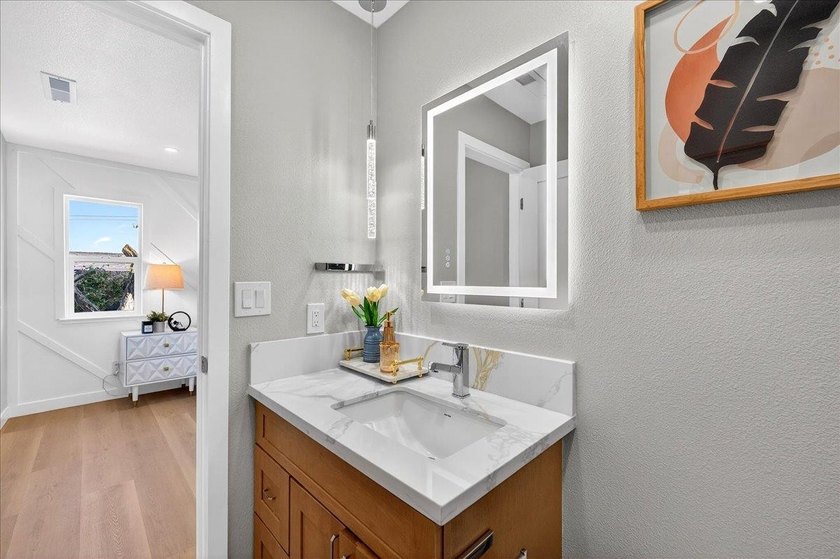Welcome home to this beautifully remodeled 4BD/2BA residence - photo 38