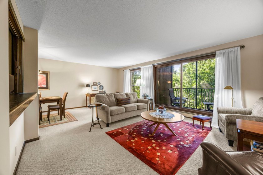 Welcome to 9600 Portland Ave S #220! This beautifully maintained - photo 9