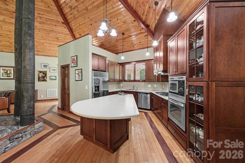 Tucked away on over 4 private wooded acres in the desirable - photo 11