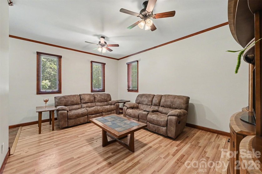 Tucked away on over 4 private wooded acres in the desirable - photo 14