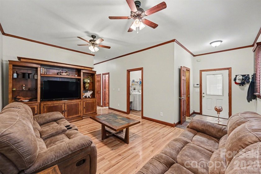 Tucked away on over 4 private wooded acres in the desirable - photo 15