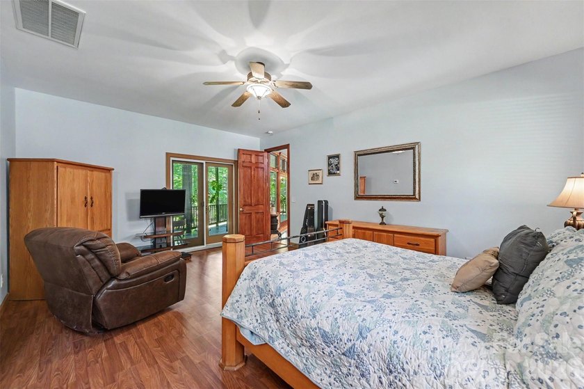 Tucked away on over 4 private wooded acres in the desirable - photo 19