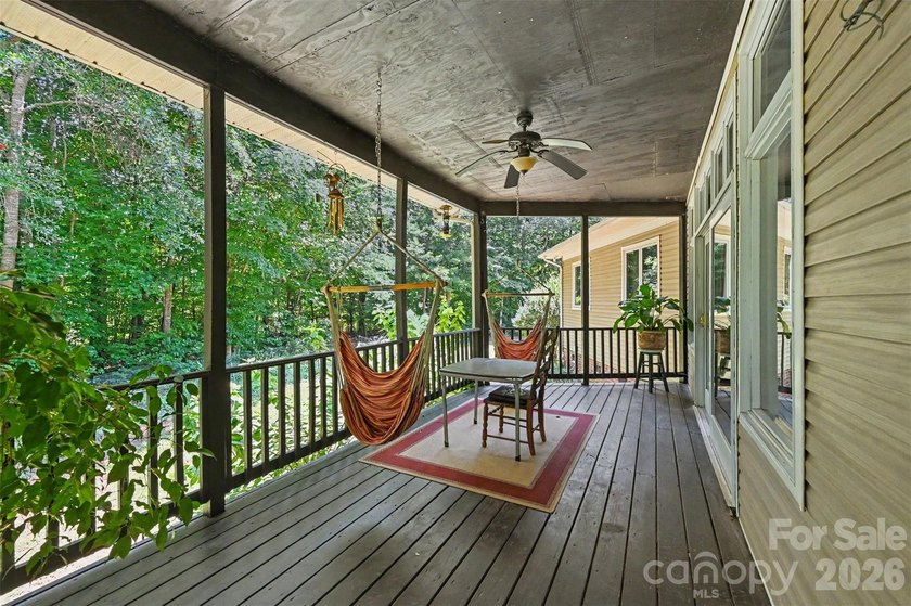 Tucked away on over 4 private wooded acres in the desirable - photo 30
