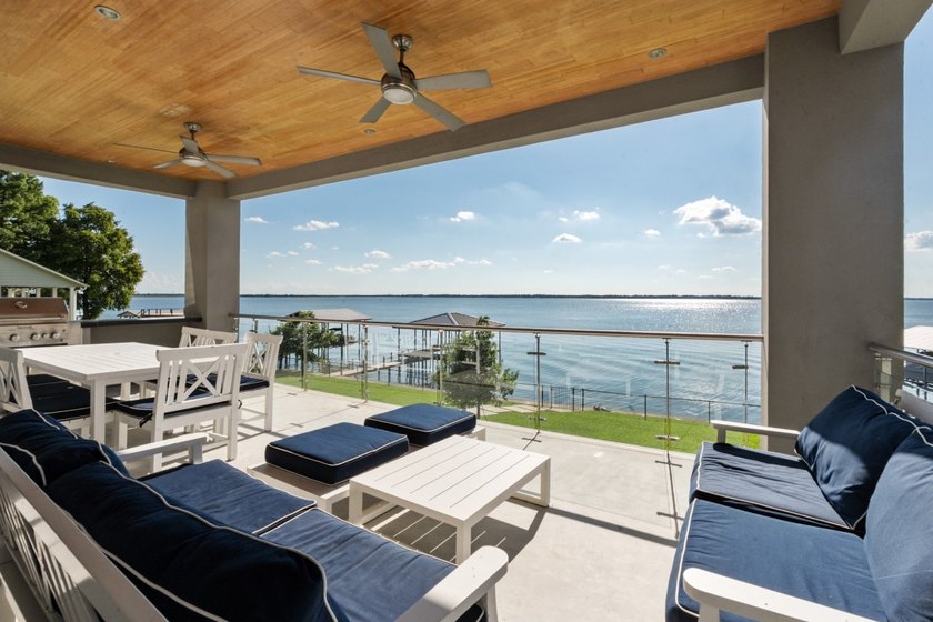 This is the lake house everyone has been waiting for. Positioned - photo 2