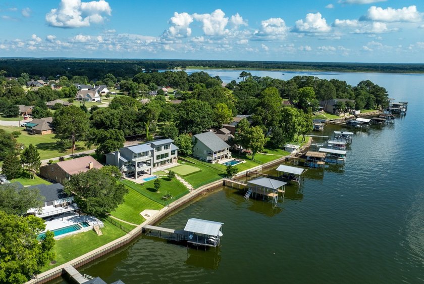This is the lake house everyone has been waiting for. Positioned - photo 5