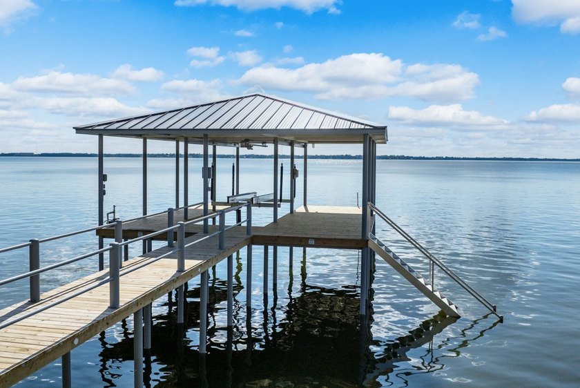 This is the lake house everyone has been waiting for. Positioned - photo 7