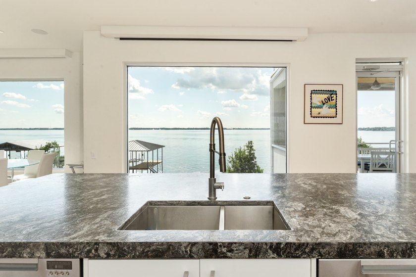 This is the lake house everyone has been waiting for. Positioned - photo 9