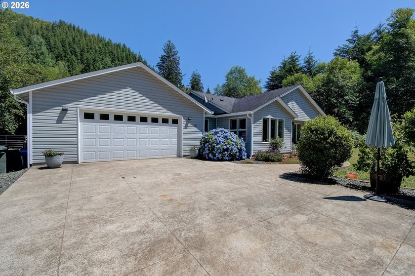 Experience peaceful country living! Featuring 2344 sq feet on a - photo 2