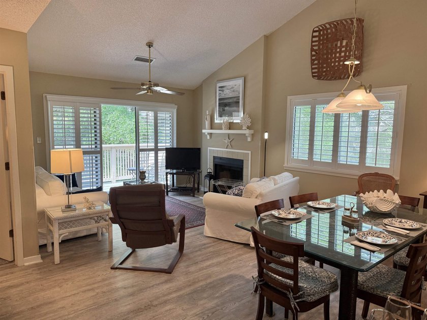 Updated and attractive second-floor end-unit villa featuring two - photo 5