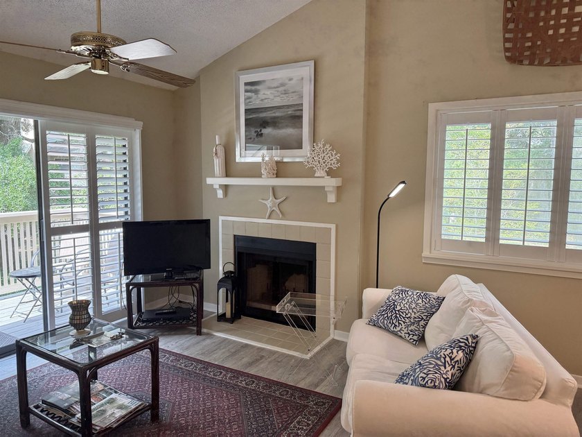 Updated and attractive second-floor end-unit villa featuring two - photo 6