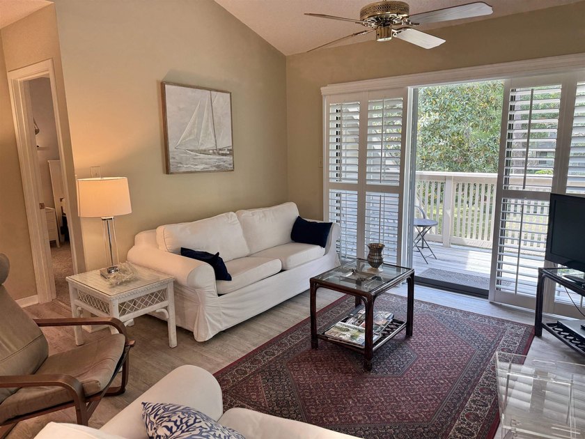 Updated and attractive second-floor end-unit villa featuring two - photo 7