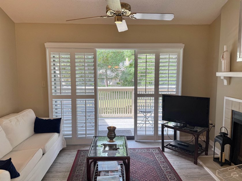 Updated and attractive second-floor end-unit villa featuring two - photo 8
