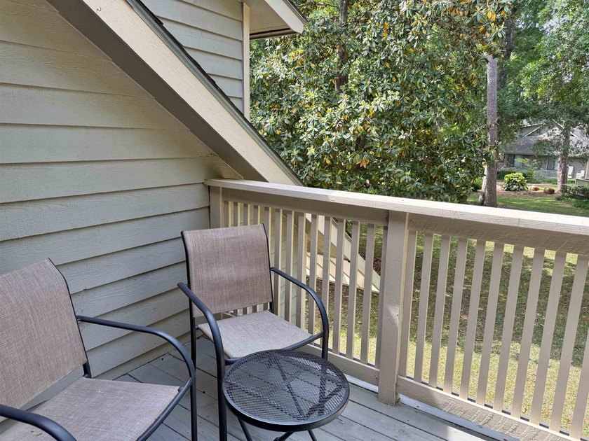 Updated and attractive second-floor end-unit villa featuring two - photo 10