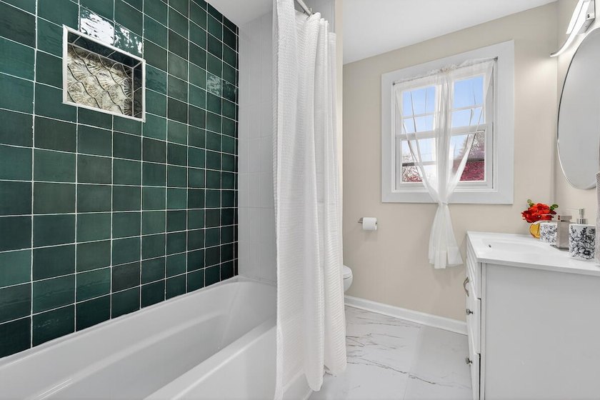 Okay, can we talk about this GEM?! This beautifully renovated - photo 11