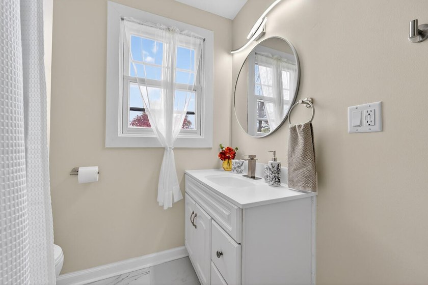 Okay, can we talk about this GEM?! This beautifully renovated - photo 12