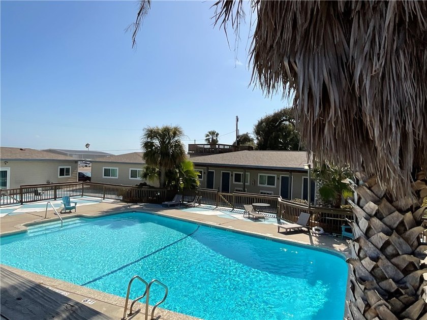 Welcome to Sandollar Condominiums, where coastal living meets - photo 23