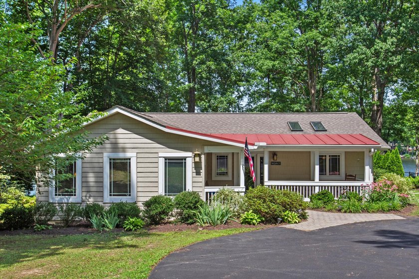 Welcome to 322 Lake Caroline Drive, where every day feels like a - photo 3