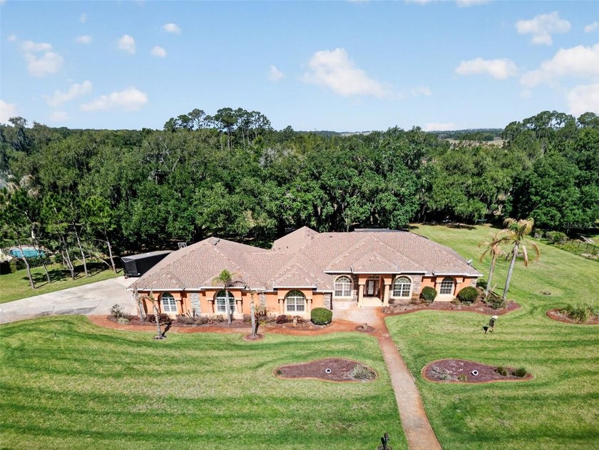 This exceptional single-story estate blends luxury, comfort, and - photo 6