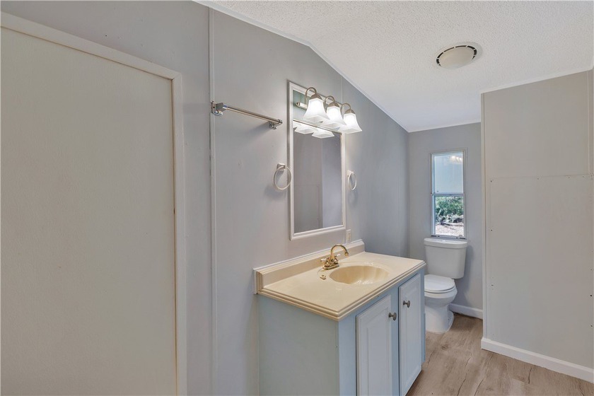Single Wide Mobile home located on a 1.28-acre level lot. Brand - photo 11