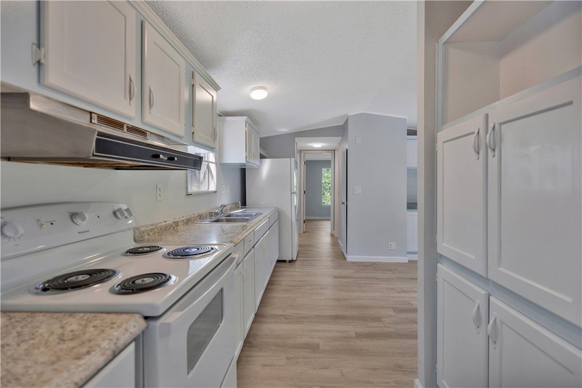 Single Wide Mobile home located on a 1.28-acre level lot. Brand - photo 12