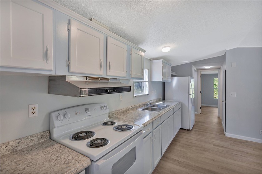 Single Wide Mobile home located on a 1.28-acre level lot. Brand - photo 13