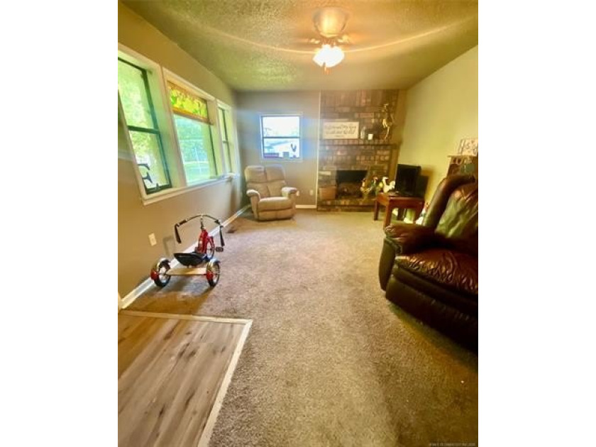 Located in Cleveland, Oklahoma, this charming residence is - photo 6