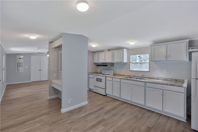 Single Wide Mobile home located on a 1.28-acre level lot. Brand - photo 16