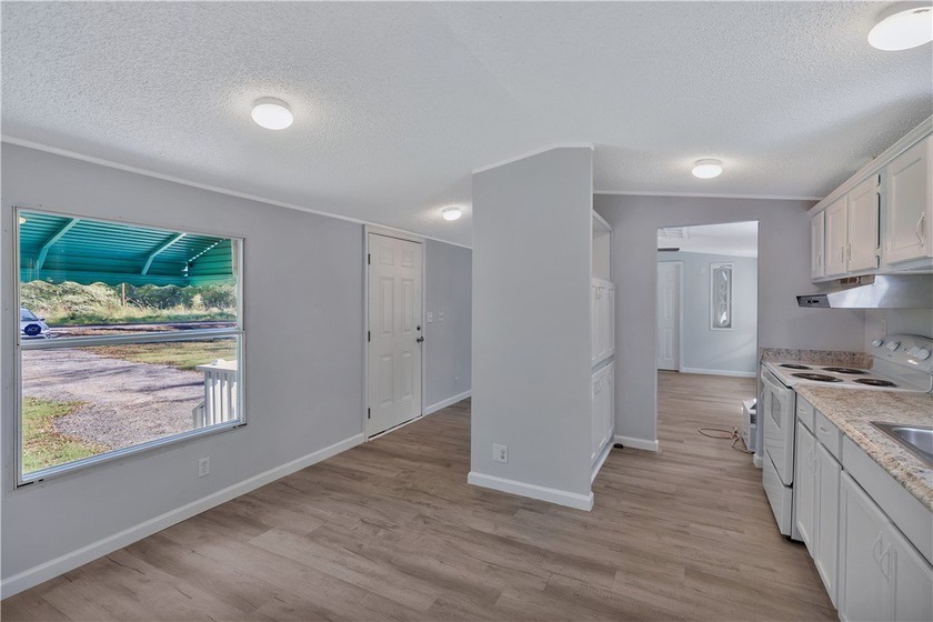 Single Wide Mobile home located on a 1.28-acre level lot. Brand - photo 17