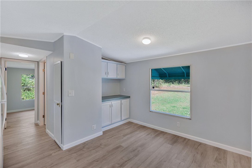 Single Wide Mobile home located on a 1.28-acre level lot. Brand - photo 18