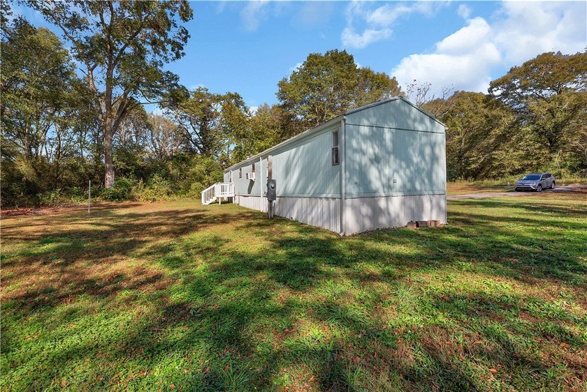 Single Wide Mobile home located on a 1.28-acre level lot. Brand - photo 25