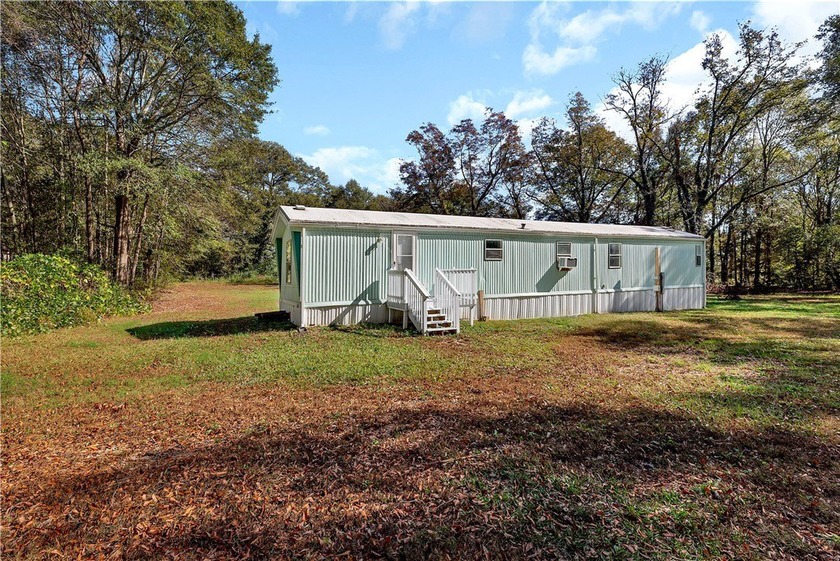Single Wide Mobile home located on a 1.28-acre level lot. Brand - photo 27