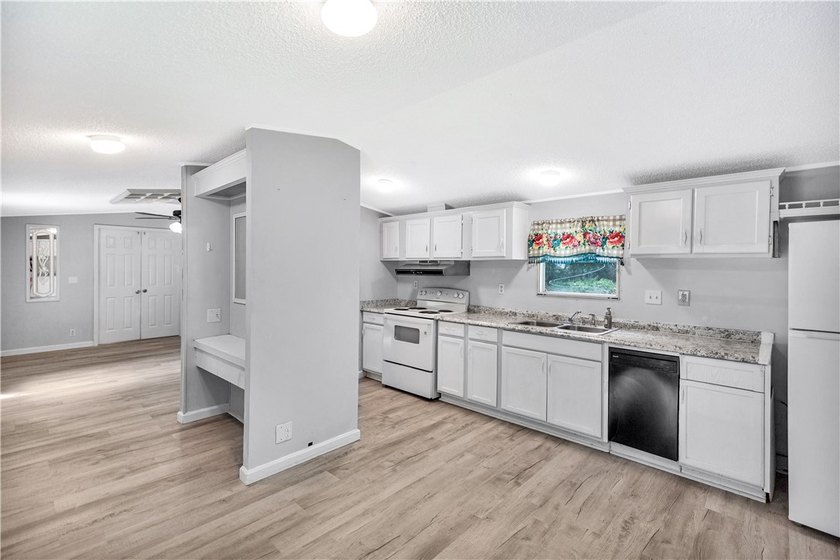 Single Wide Mobile home located on a 1.28-acre level lot. Brand - photo 37
