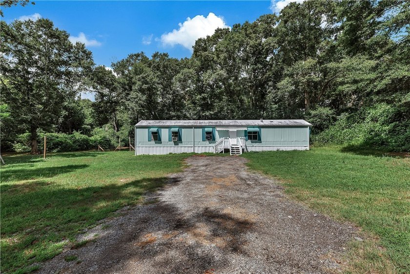 Single Wide Mobile home located on a 1.28-acre level lot. Brand - photo 45