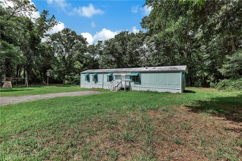 Single Wide Mobile home located on a 1.28-acre level lot. Brand - photo 46