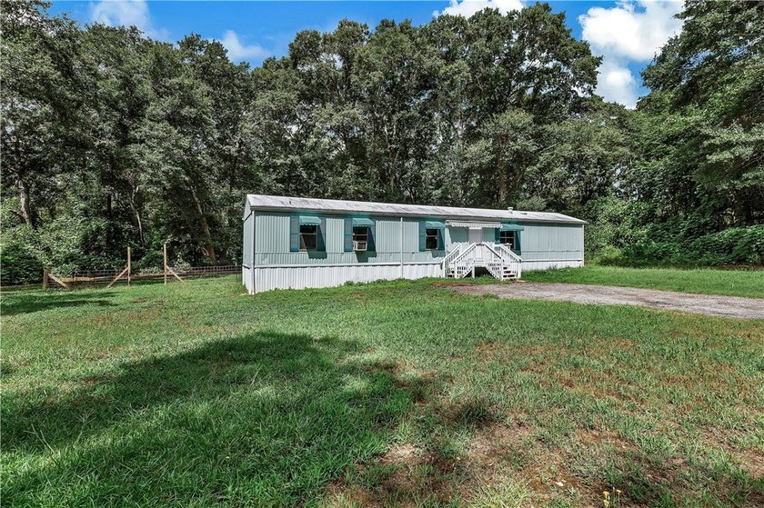 Single Wide Mobile home located on a 1.28-acre level lot. Brand - photo 47