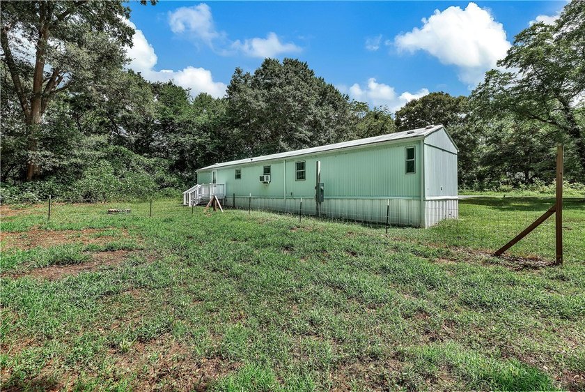 Single Wide Mobile home located on a 1.28-acre level lot. Brand - photo 48