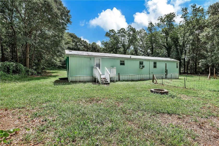 Single Wide Mobile home located on a 1.28-acre level lot. Brand - photo 49